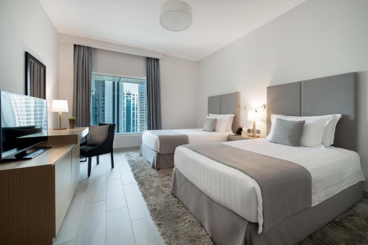 Centara West Bay Hotel & Residences Ad Dawhah Esterno foto A typical guest room at the hotel