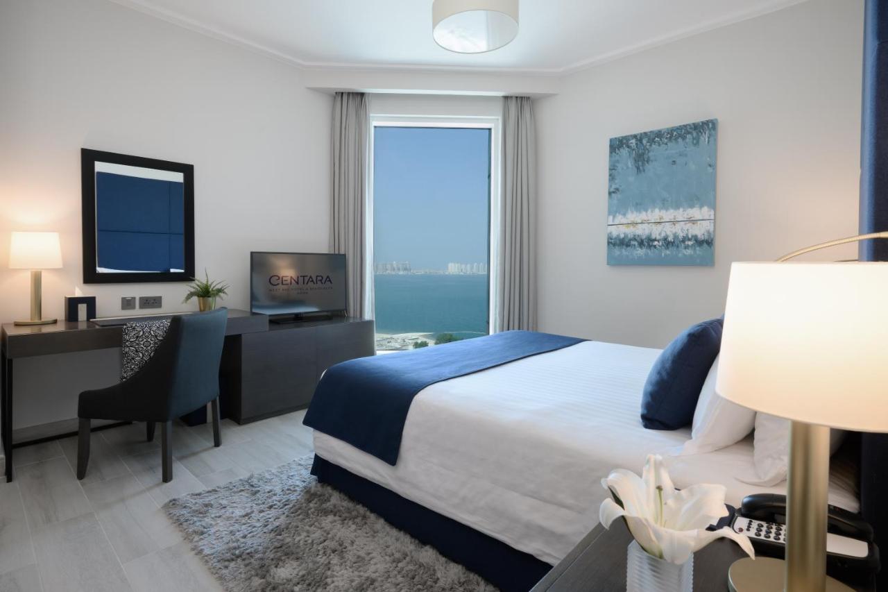 Centara West Bay Hotel & Residences Ad Dawhah Esterno foto A bedroom at the Ritz-Carlton, Bahrain