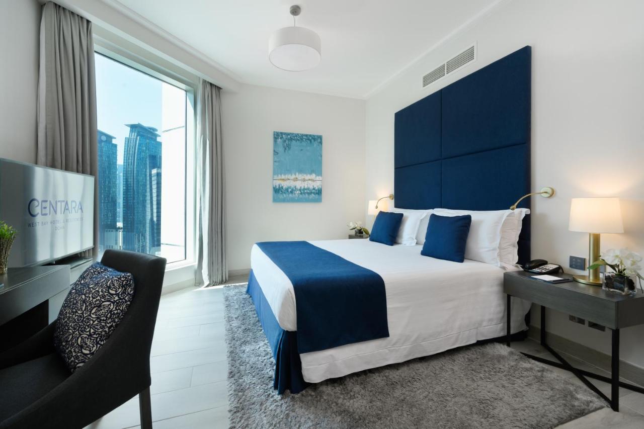 Centara West Bay Hotel & Residences Ad Dawhah Esterno foto A bedroom at the Address Downtown Hotel
